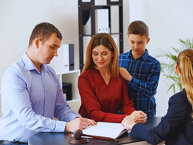 Divorced parents with their son visiting lawyer. Mistakes in Uncontested Divorce