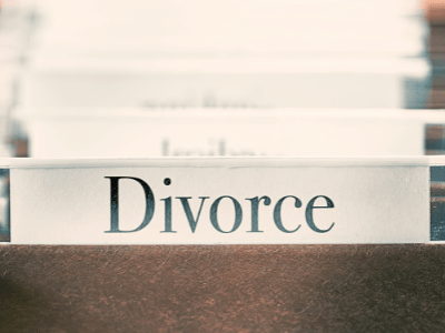 Some folders, and one of them says "Divorce." spouse lives in another state